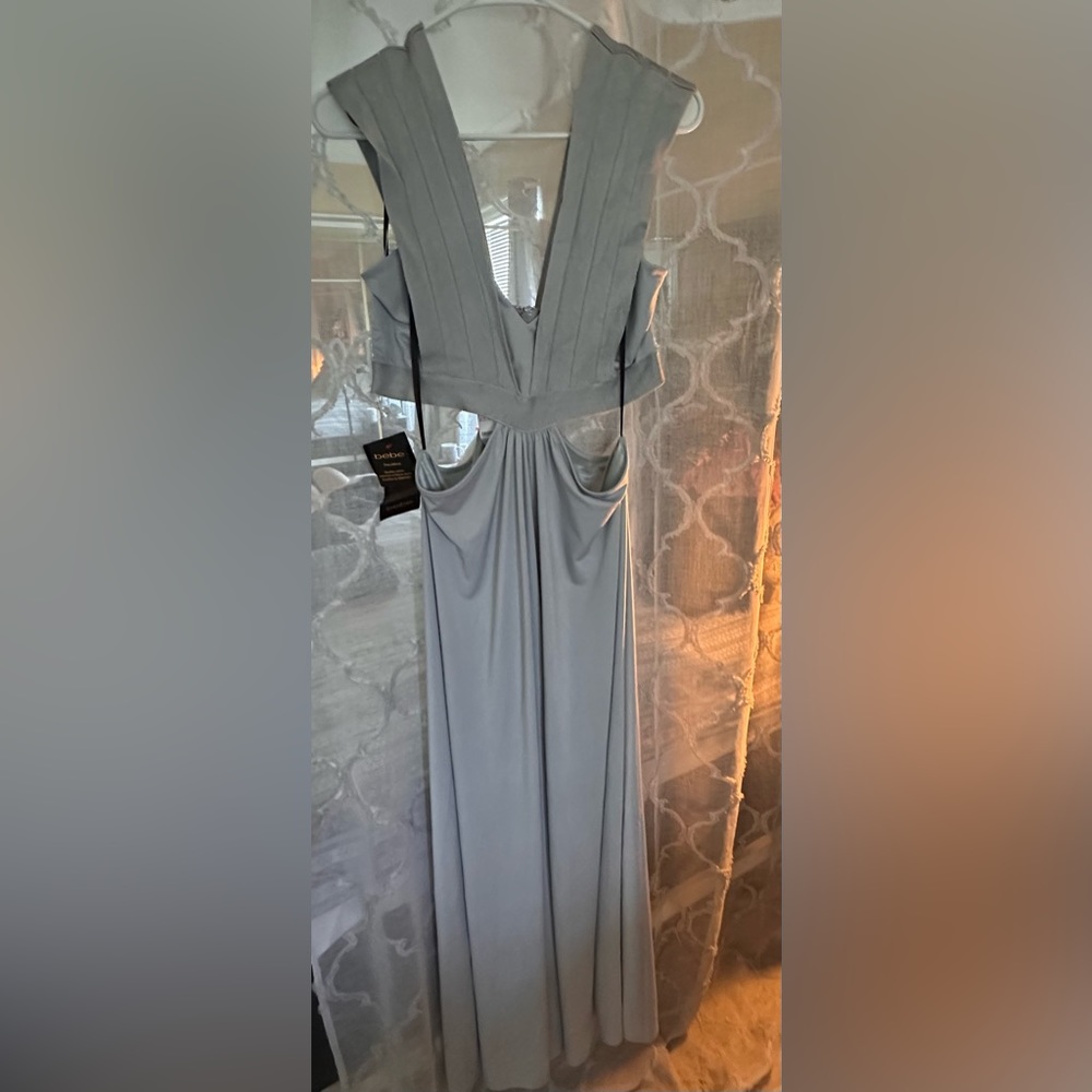 Bebe dress with middle cut out. Long and flowing